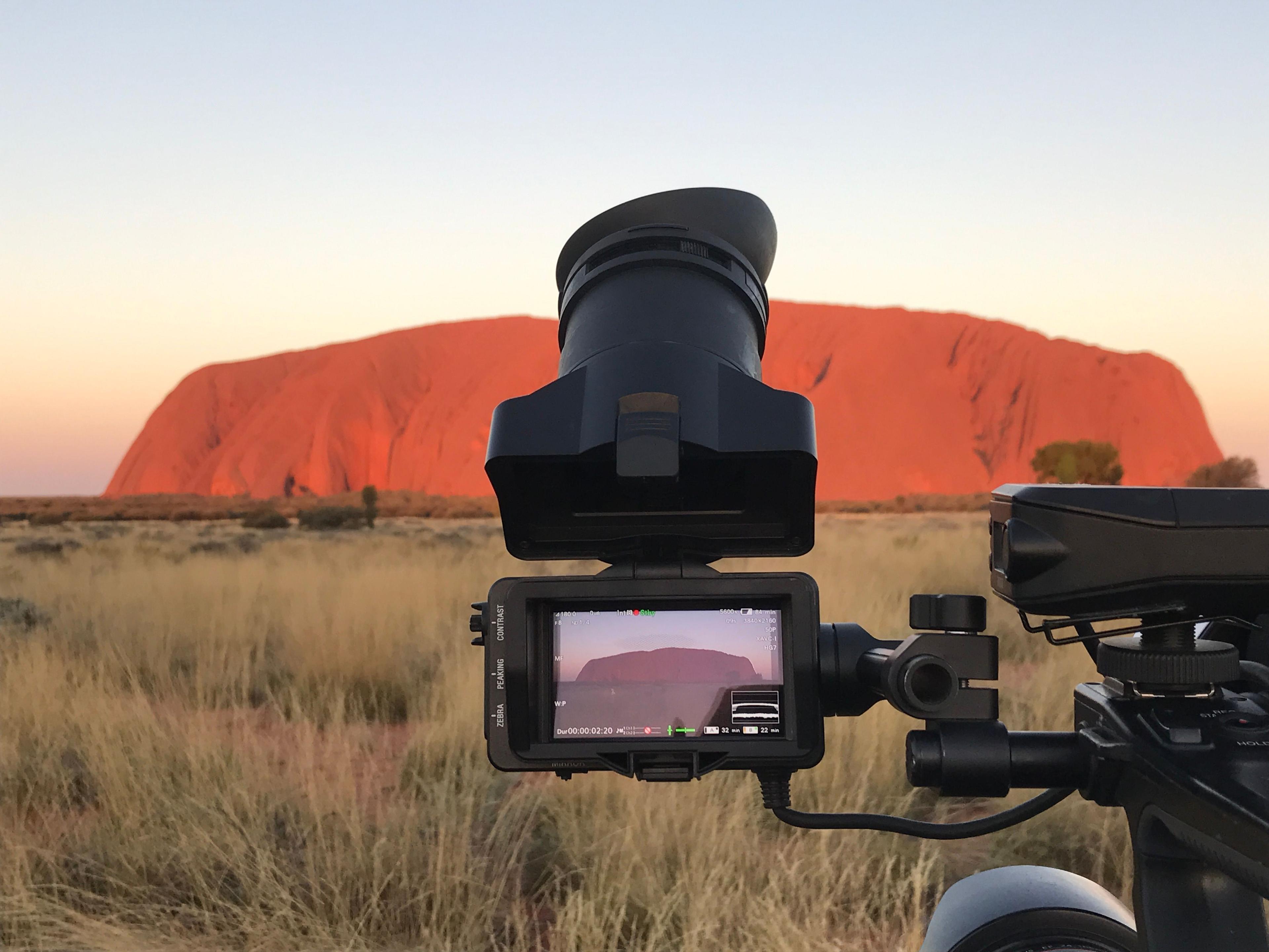 camera in front of Uluru