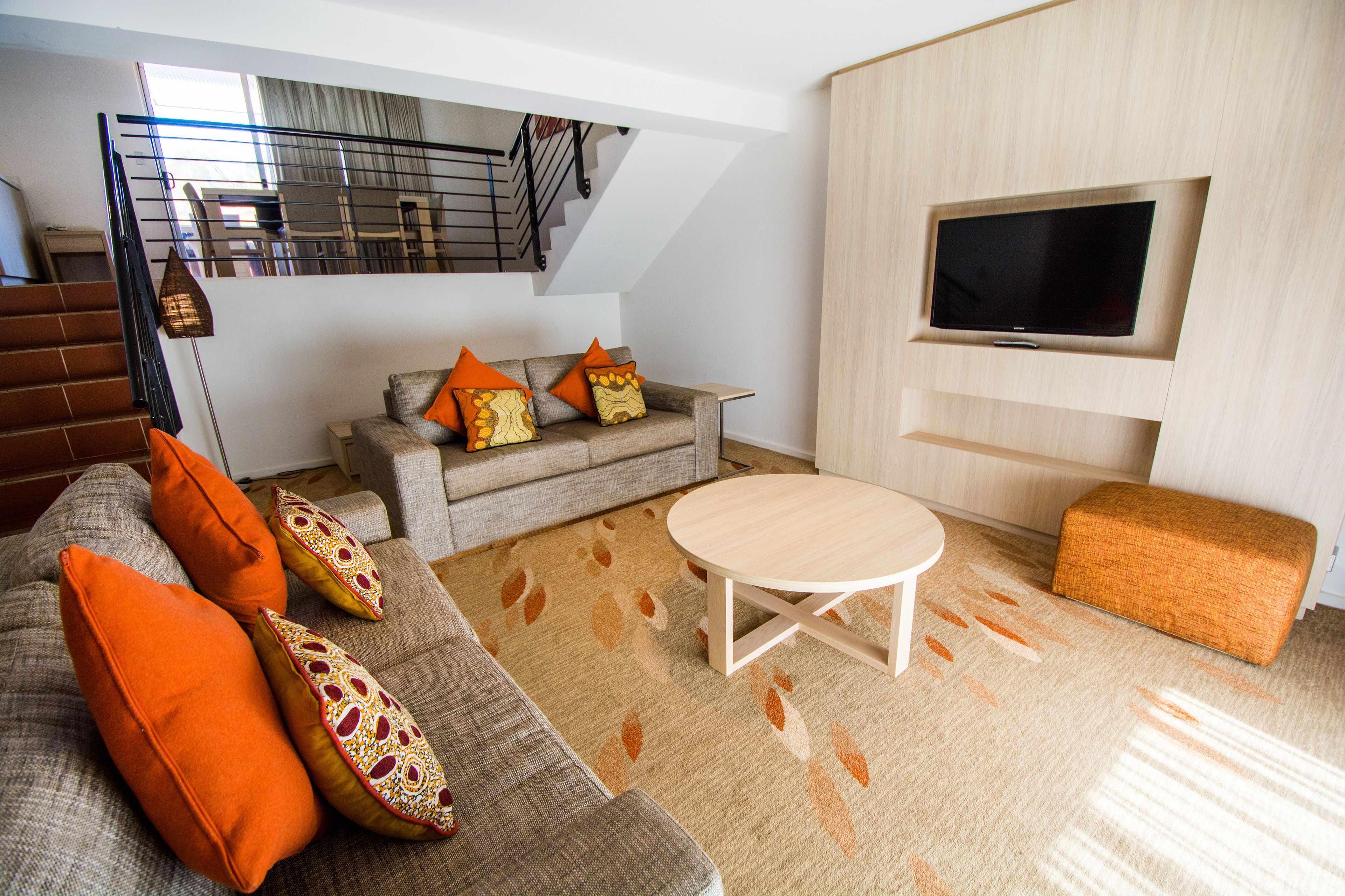 colorful living room in 2 bedroom apartment