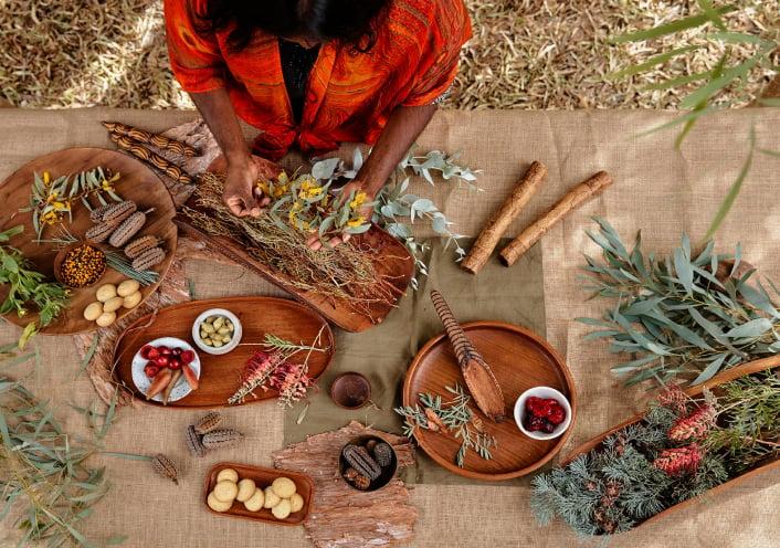 Indigenous woman making art with her hands