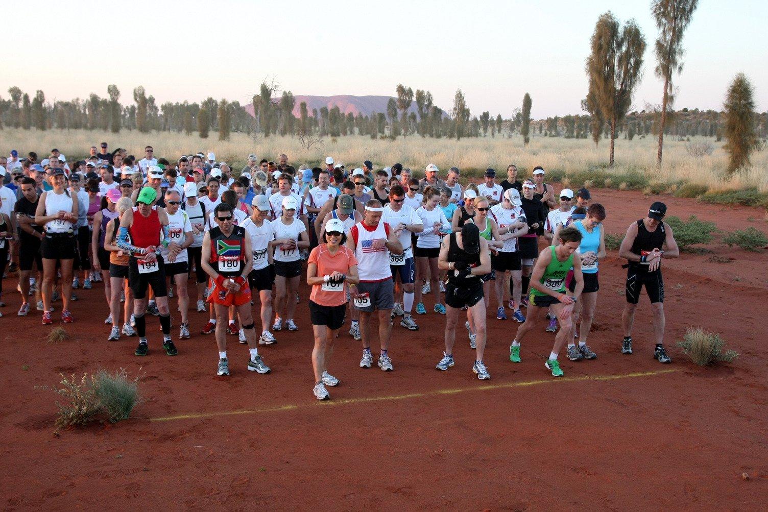 Runners at the start line before running the Outback Marathon in Yulara