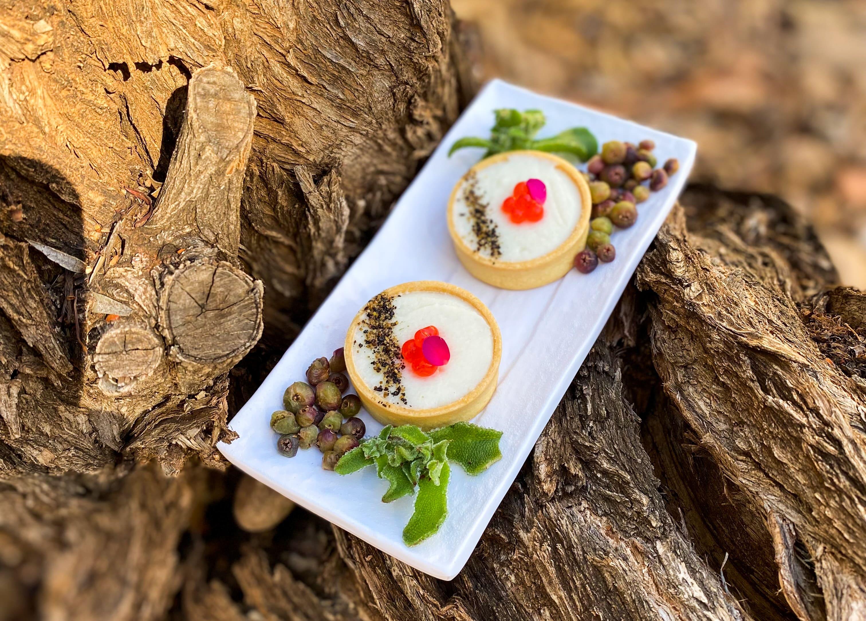 Cauliflower mousse tartlet with bush tomato pearls and wattleseeds