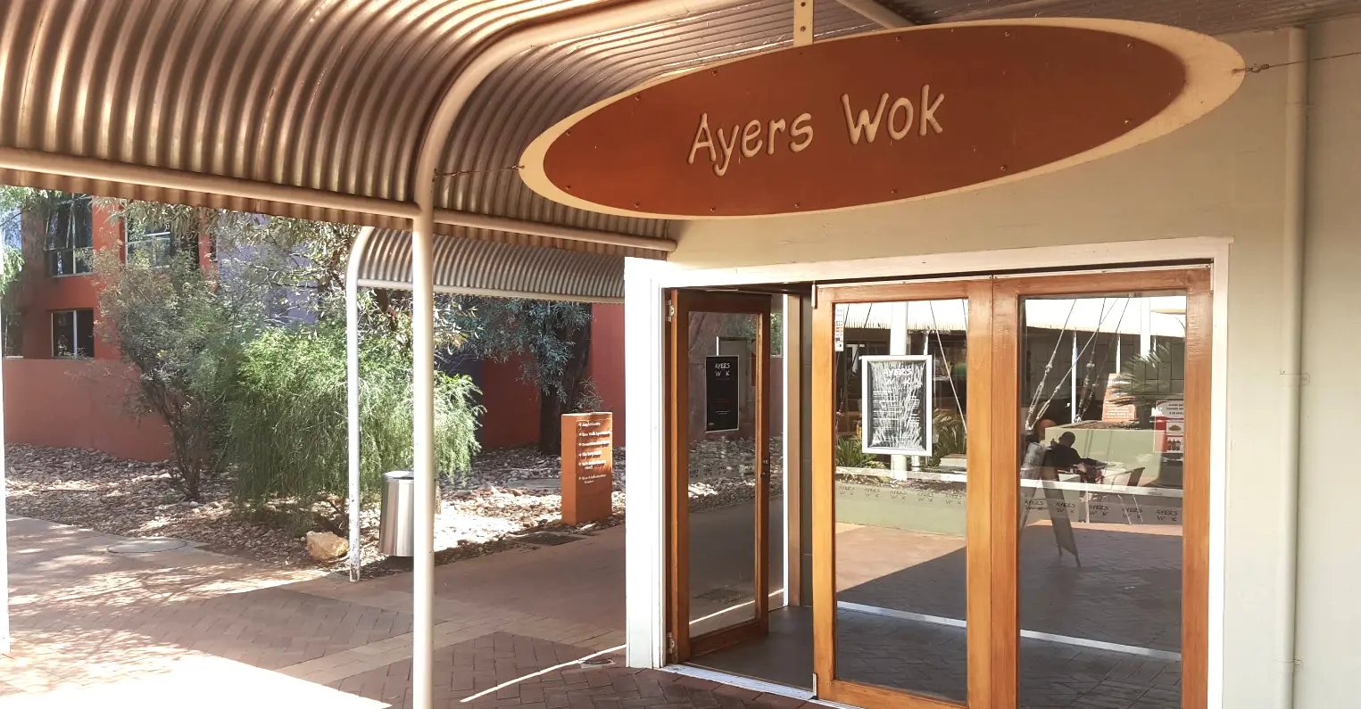 Entrance of Ayers Wok with a large Ayers Wok Sign in Towns Square