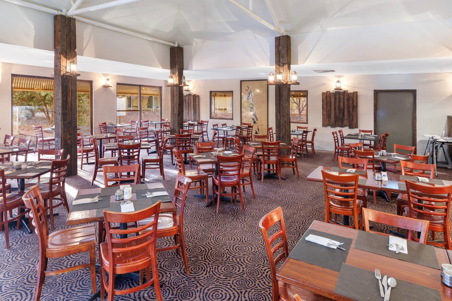 Interior of Bough House Restaurant with dark oak tables and chairs
