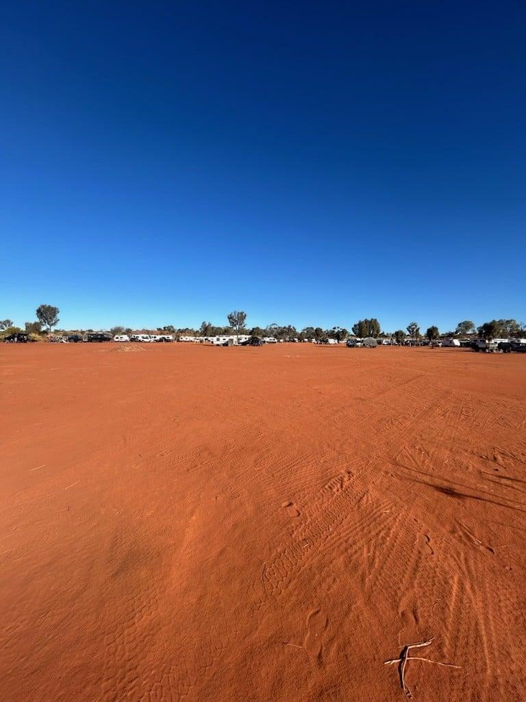 Red dirt of the Desert Camp at Ayers Rock Campground